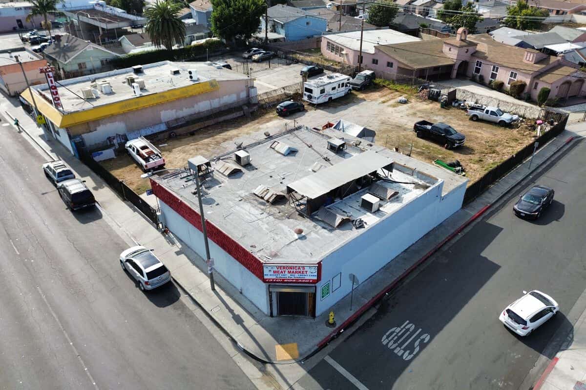 12203 Long Beach Blvd — corner retail building and gated parking, Lynwood