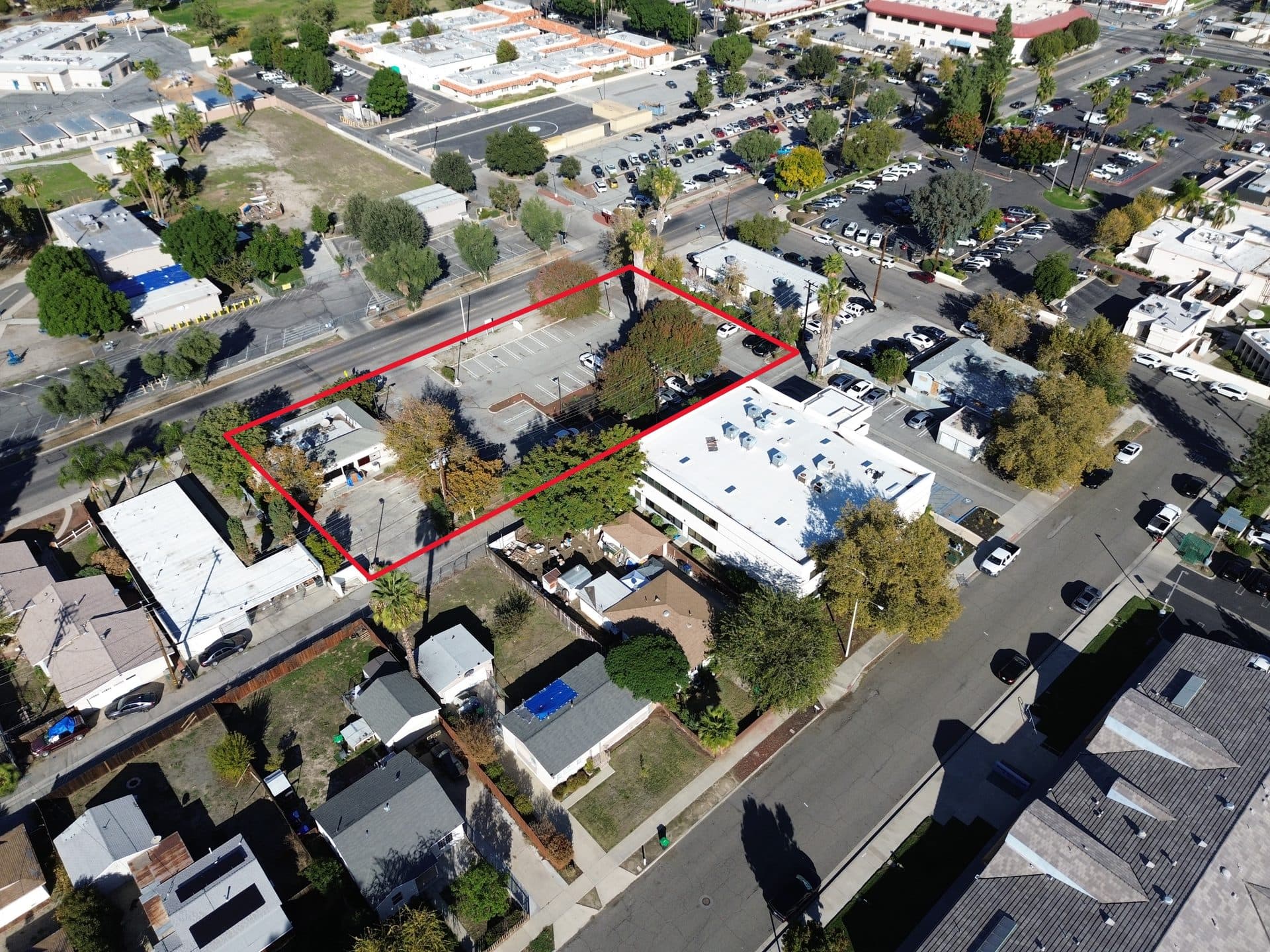 Oblique aerial — 1003 E Devonshire Ave lot, building pad, and Hemet medical corridor