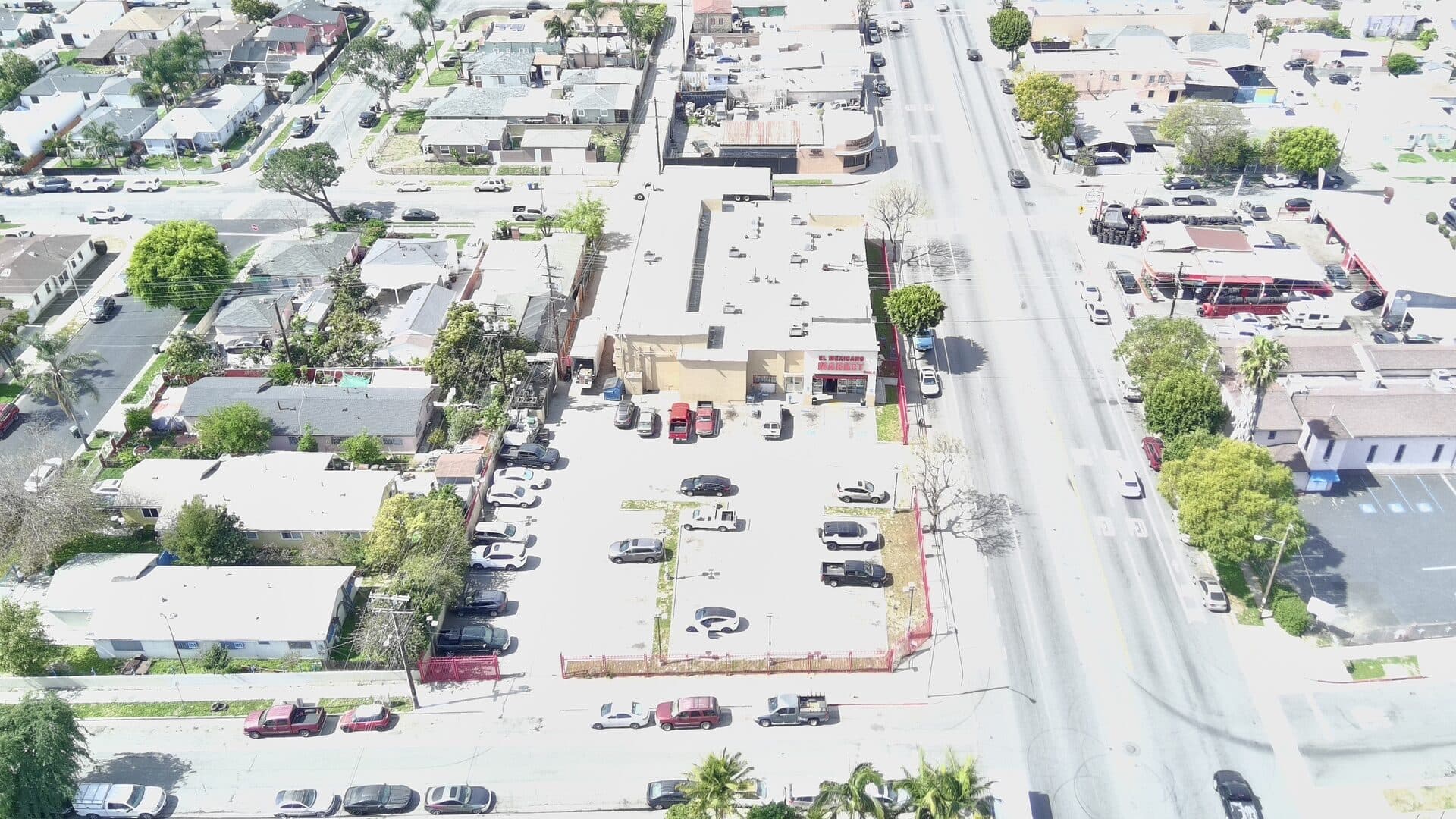 Top-down drone view — parcel, Alondra Blvd corridor, residential catchment