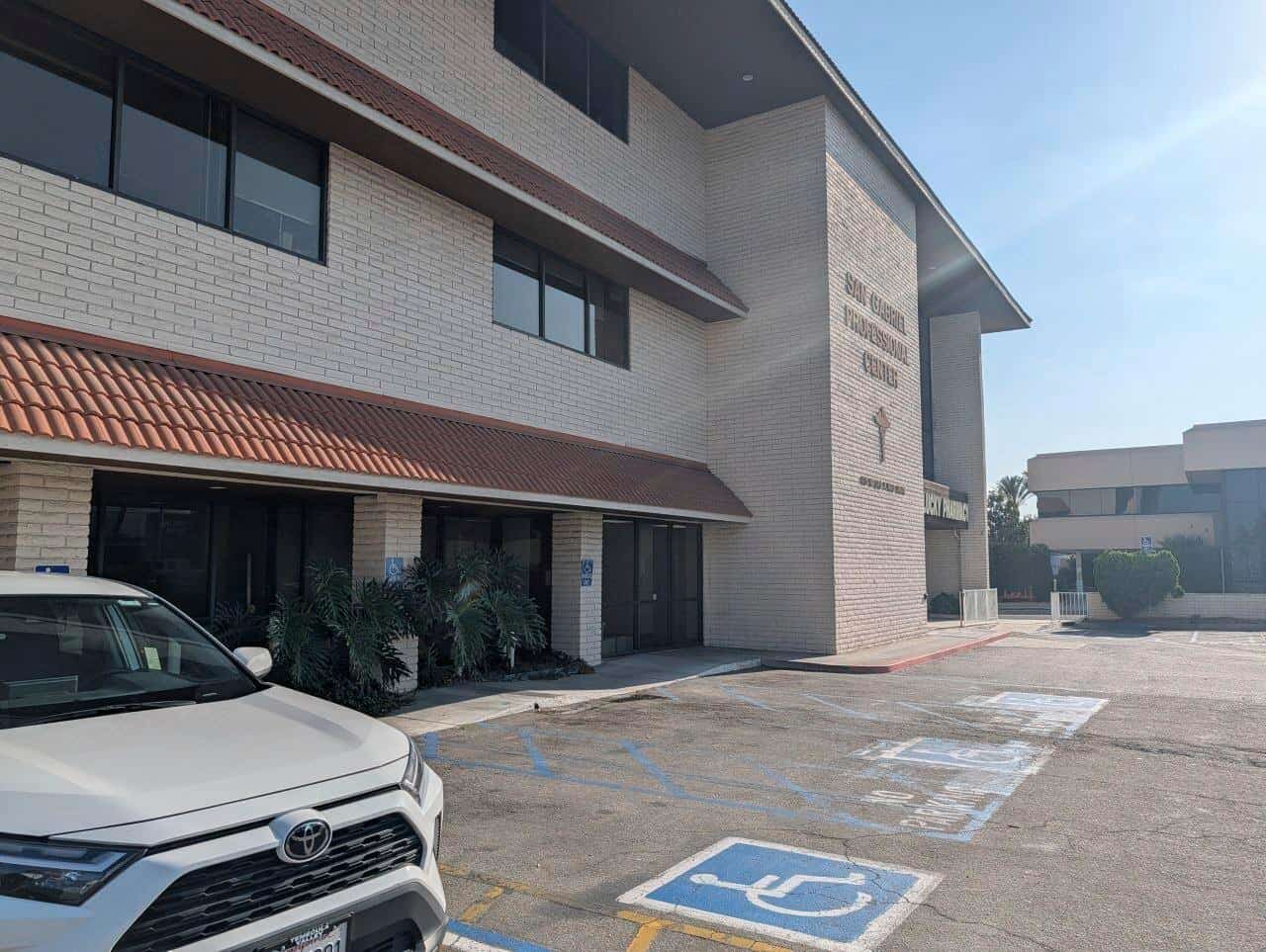 San Gabriel Professional Center at 416 W Las Tunas Dr — three-story medical office, ADA surface parking, Lucky Pharmacy entry